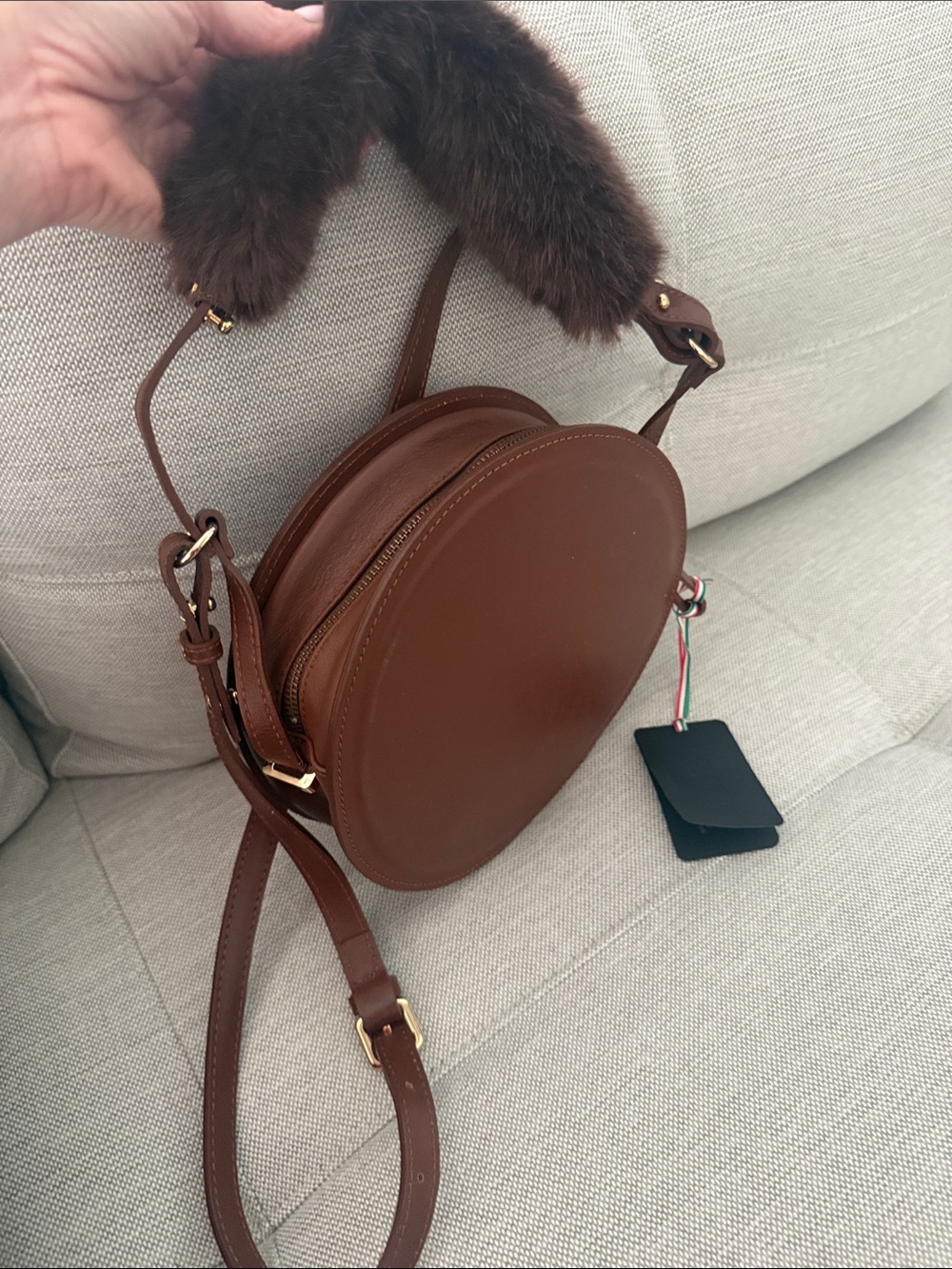Round BOHO convertible crossbody in brown Italian leather. NWT